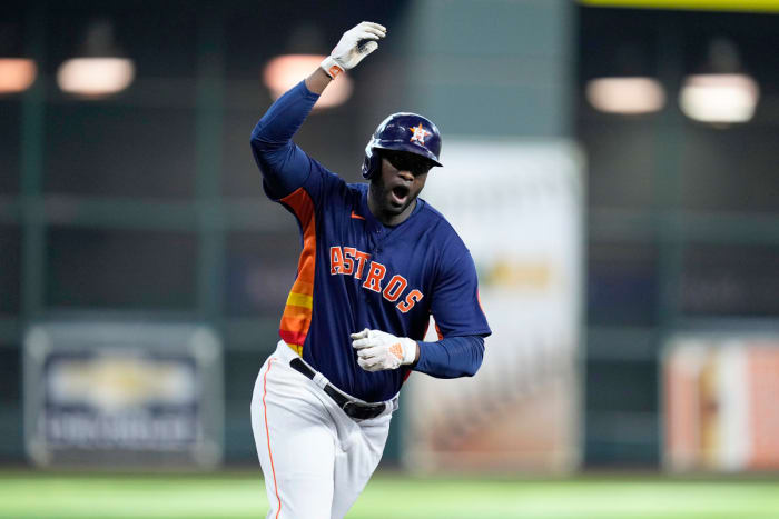 Yordan Alvarez celebrates his two-run home run in Game 2 of the ALDS